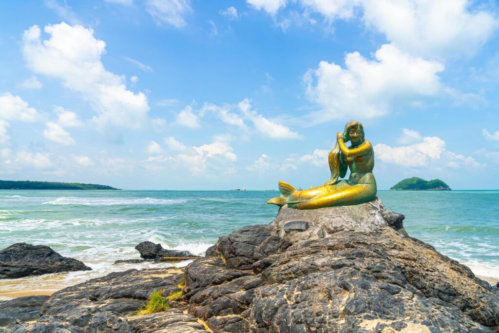 golden mermaid statues on samila beach landmark of songkla in thailand free photo